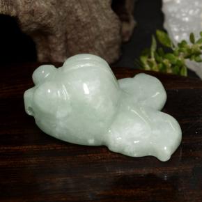 41.6ct Carved Fish with Hole White Green Jadeite for sale thumb image of 41.6ct Carved Fish with Hole White Green Jadeite (ID: 472059)