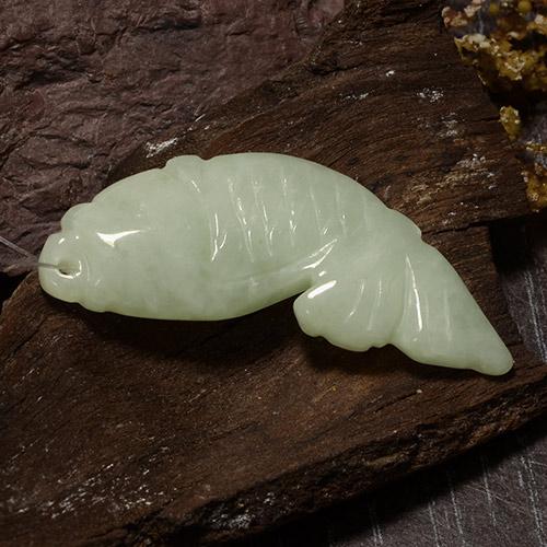 32.7ct Carved Fish with Hole Green Jadeite for sale thumb image of 32.7ct Carved Fish with Hole Green Jadeite (ID: 484955)