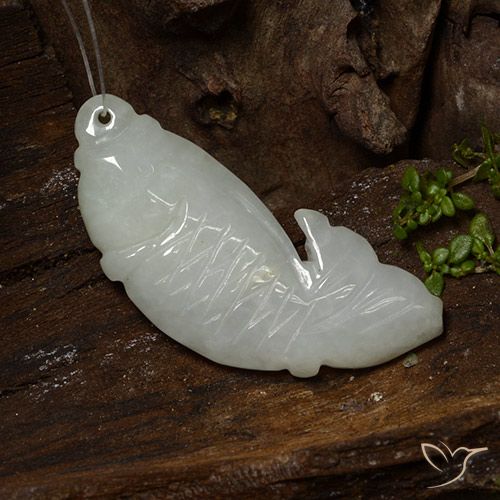 34.27 ct White Jadeite, 38.4 x 14.9 mm Carved From Myanmar, Photo A
