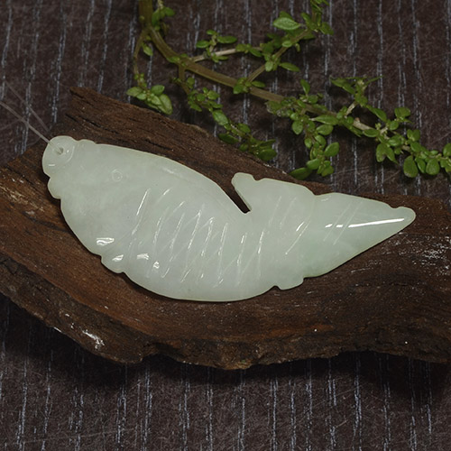 26.3ct Carved Fish with Hole Green White Jadeite Gem for sale 26.3ct Carved Fish with Hole Green White Jadeite Gem (ID: 485004)