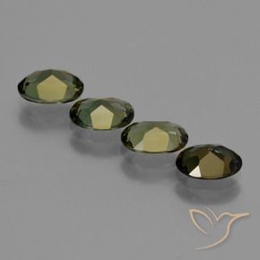 Kornerupine Gemstones in 6.5 x 5 mm Size for Sale, Kornerupine Stones in Deep Earth Green Color