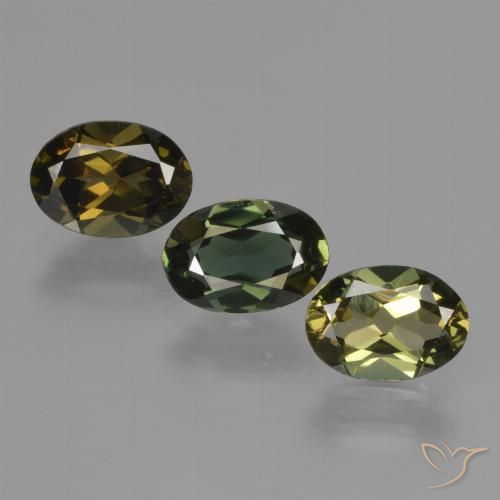 3 Stück ovaler brauner Kornerupin Set aus Sri Lanka - Gewicht 2,04 ct total / Durchschn. je 0,68 ct, Größe 6,6 x 4,7mm, Farbe: Grünlich-braun, Mohs-Härte 6,5 - 7 Geeignet für den täglichen Gebrauch im Schmuck, Photo A