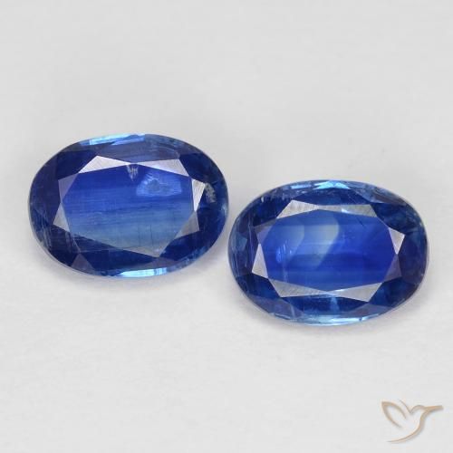Coppia Cianite taglio ovale da 7,2 x 5,2mm abbinati - Peso 2 ct totali / media. 1 ct ciascuno, colore Blu scuro in purezza VS, pietra preziosa naturale non trattati, durezza Mohs 6 - 7, Photo A