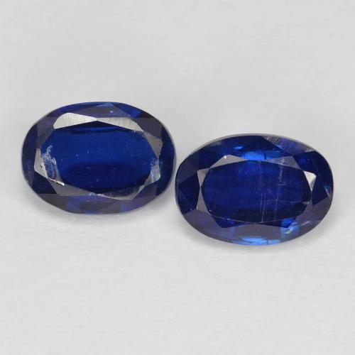Cianita Ovalada a juego de 2 piezas en tamaño 7,1 x 5,1mm, peso 2,17 ct en total / promedio. 1,09 ct cada uno, Azul oscuro en claridad vs-si, piedra preciosa natural No tratado, dureza de Mohs 6 - 7, Photo A