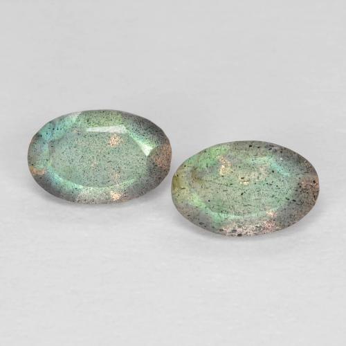 Labradorita Ovalada a juego de 2 piezas en tamaño 6 x 3,9mm, peso 0,83 ct en total / promedio. 0,42 ct cada uno, Multicolor en claridad Transparente, piedra preciosa natural No tratado, dureza de Mohs 6 - 6.5, Photo A