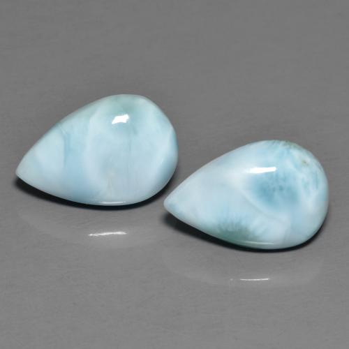 Груша пара Ларимар 12,1 x 8,1 mm - общий вес 4,37 ct / средн. 2,19 ct каждый, Светло-синий цвет, чистота: Opaque, натуральный без дополнительной обработки драгоценный камень, твердость по Моосу 4,5 - 5, Photo A