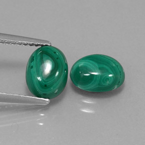 3.87 ct Green Malachite Gemstone, Malachite Gem in Oval Cabochon Shape for Sale.