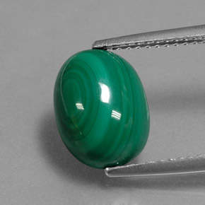 4.97 ct Green Malachite Gemstone, Malachite Gem in Oval Cabochon Shape for Sale.