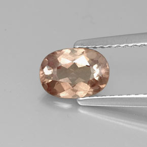 0.98 ct Pink Malaya Garnet Gemstone, Malaya Garnet Gem in Oval Facet Shape for Sale.
