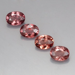 3.97 ct Pink Malaya Garnet Gemstone, Malaya Garnet Gem in Oval Facet Shape for Sale.