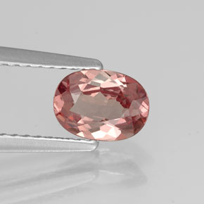 0.88 ct Pink Malaya Garnet Gemstone, Malaya Garnet Gem in Oval Facet Shape for Sale.