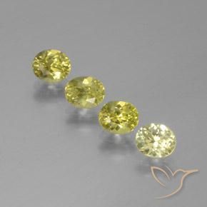 Лот из 4 шт. Овал Желтый Гранат Мали из Мали - размер 5,4 x 4,7 mm, общий вес 2,45 ct / средн. 0,61 ct каждый, цвет: Средний желтый, твердость по Моосу 6,5 - 7,5 подходит для повседневного ношения украшений, Photo A