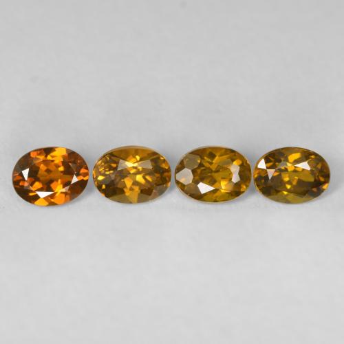 Лот из 4 Овал Золотой Гранат Мали из Мали - общий вес 2,21 ct / средний вес. 0,55 ct каждый, размер 5,5 x 4,2 mm, цвет: Глубокое золото, твердость по Моосу 6,5 - 7,5 подходит для повседневного ношения украшений, Photo A