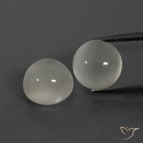 Paire Pierre de Lune Tour 9,1mm - Poids total 7,56 ct / moyenne 3,78 ct chaque, pierre gemme naturelle Non traité, couleur Blanc chaud avec pureté Translucide, dureté Mohs 6 à 6.5, Photo A