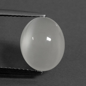 Warm White Лунный Камень Камень - 3.9ct Овал Кабошон (ID: 458796)