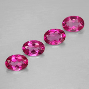 3.49 ct Red Mystic Topaz Gemstone, Mystic Topaz Gem in Oval Facet Shape for Sale.