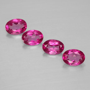 3.47 ct Red Mystic Topaz Gemstone, Mystic Topaz Gem in Oval Facet Shape for Sale.