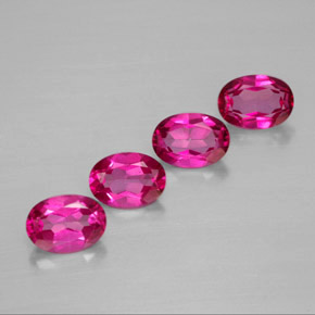 4.11 ct Red Mystic Topaz Gemstone, Mystic Topaz Gem in Oval Facet Shape for Sale.