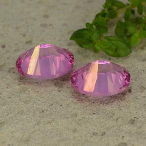 Mystic Topaz Gemstones in 9 x 7 mm (calibrated) Size for Sale, Mystic Topaz Stones in Dark Pink Color