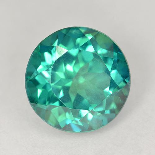 Зелёный фионит камень. Зеленый драгоценный камень топаз. Грин дорлинг камень зелёный. Сине зеленый сапфир. Гидротермальный синтез изумрудов.