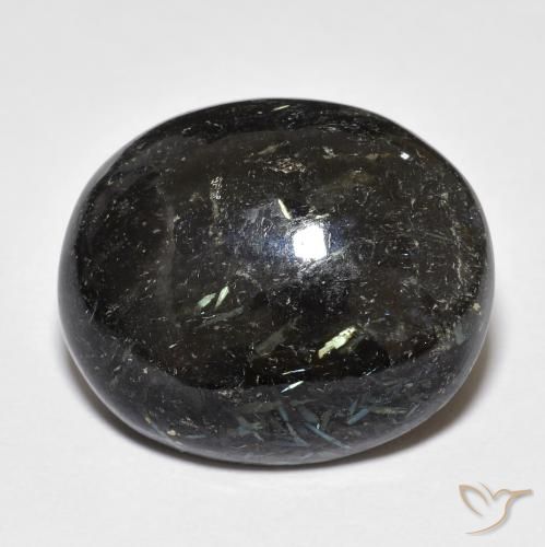 Nuummite 20,1 x 16,8mm nero Ovale cabochon dall'India, peso di 23,53 ct, gemma naturale non trattati in purezza Opaque, 1 pezzo Nuummite - Colore: Nero con scintillio blu, durezza Mohs di 5,5 - 6, Photo A