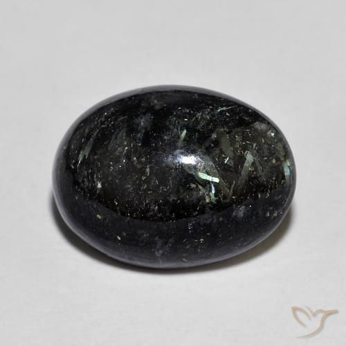 15,4 x 11,6mm Nuummite nero Ovale cabochon dall'India, peso di 8,46 ct, pietra preziosa naturale non trattati in purezza Opaque, Nuummite 1pz - il colore è Nero con scintillio blu, durezza Mohs di 5,5 - 6, Photo A