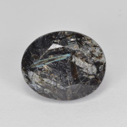 13 x 10.7mm Oval Facet Black Nuummite from India, Weight of 7.07ct, Natural untreated gemstone in Opaque Clarity, 1pc Nuummite - the Color is Black With Blue Sparkle, Mohs Hardness of 5.5 - 6, Photo A