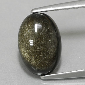 2.56 ct Yellow Obsidian Gemstone, Obsidian Gem in Oval Cabochon Shape for Sale.
