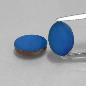 0.7ct Oval Cabochon Blue Opal Doublet Gem for sale 0.7ct Oval Cabochon Blue Opal Doublet Gem (ID: 249665)