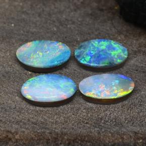 0.6ct Oval Cabochon Multicolor Opal Doublet for sale thumb image of 0.6ct Oval Cabochon Multicolor Opal Doublet (ID: 294054)