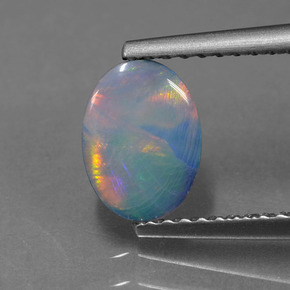 0.69 ct Multicolor Opal Doublet Gemstone, Opal Doublet Gem in Oval Cabochon Shape for Sale.
