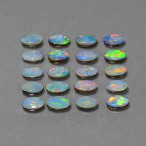 0.4ct Oval Cabochon Multicolor Opal Doublet Gem for sale 0.4ct Oval Cabochon Multicolor Opal Doublet Gem (ID: 446911)