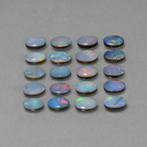 0.4ct Oval Cabochon Multicolor Opal Doublet Gem for sale 0.4ct Oval Cabochon Multicolor Opal Doublet Gem (ID: 446916)