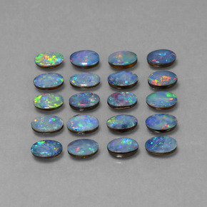 0.4ct Oval Cabochon Multicolor Opal Doublet Gem for sale 0.4ct Oval Cabochon Multicolor Opal Doublet Gem (ID: 446917)