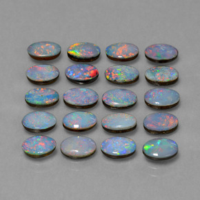 0.4ct Oval Cabochon Multicolor Opal Doublet Gem for sale 0.4ct Oval Cabochon Multicolor Opal Doublet Gem (ID: 446920)