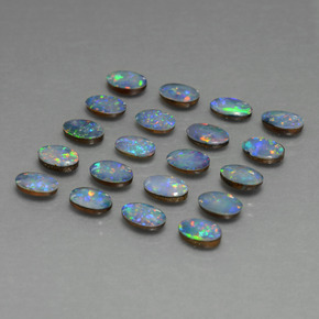 0.4ct Oval Cabochon Multicolor Opal Doublet for sale thumb image of 0.4ct Oval Cabochon Multicolor Opal Doublet (ID: 449352)
