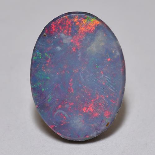 Mehrfarbig Opal-Dublette Edelstein - 0.8ct Oval Cabochon (ID: 517745)
