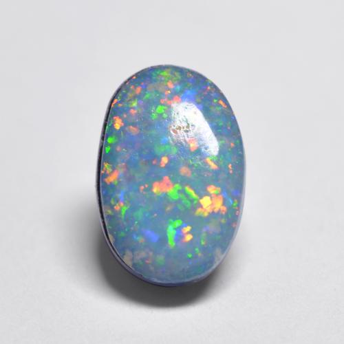 Mehrfarbig Opal-Dublette Edelstein - 0.7ct Oval Cabochon (ID: 544585)