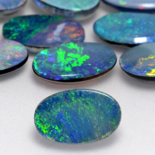 0.75 ct Multicolor Opal Doublet Gemstone, Opal Doublet Gem in Oval Cabochon Shape for Sale.