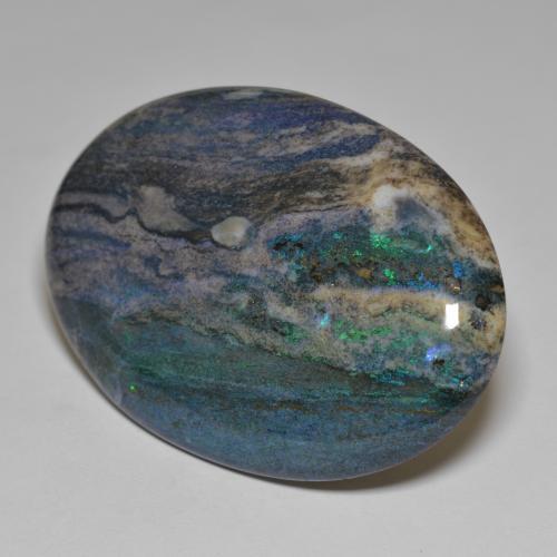 Multicolore Opale en Matrice gemme - 66.8ct Ovale Cabochon (ID: 578233)