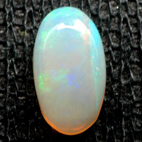 0.63 ct Multicolor Opal Stone, Natural Opal in Oval Cabochon Shape for Sale