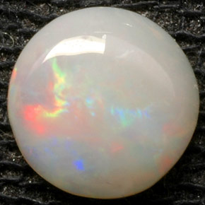 0.52 ct Multicolor Opal Gemstone, Opal Gem in Round Cabochon Shape for Sale.