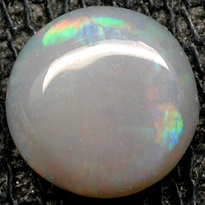 0.55 ct Multicolor Opal Gemstone, Opal Gem in Round Cabochon Shape for Sale.