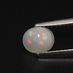 0.70 ct Multicolor Opal Gemstone, Opal Gem in Oval Cabochon Shape for Sale.
