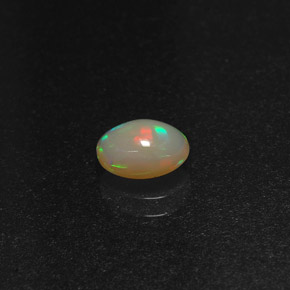 0.58 ct Multicolor Opal Stone, Natural Opal in Oval Cabochon Shape for Sale