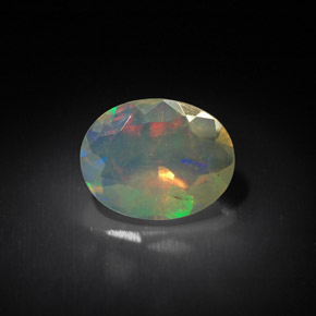 1.31 ct Multicolor Opal Gemstone, Opal Gem in Oval Facet Shape for Sale.