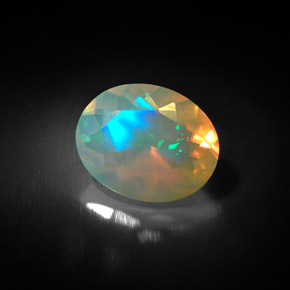 1.35 ct Multicolor Opal Stone, Natural Opal in Oval Facet Shape for Sale