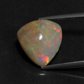 4.22 ct Multicolor Opal Gemstone, Opal Gem in Trillion Cabochon Shape for Sale.