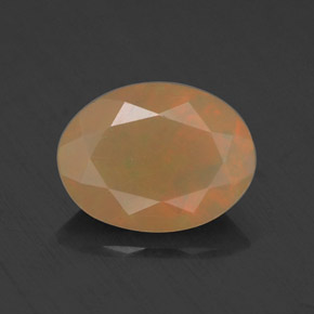 0.69 ct Multicolor Opal Gemstone, Opal Gem in Oval Facet Shape for Sale.