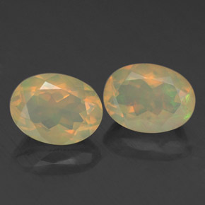 1.79 ct Multicolor Opal Gemstone, Opal Gem in Oval Facet Shape for Sale.